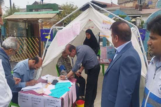 برپایی چادر سلامت درآستانه اشرفیه توسط شبکه بهداشت
